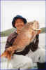 A happy Alan Yip with his catch.